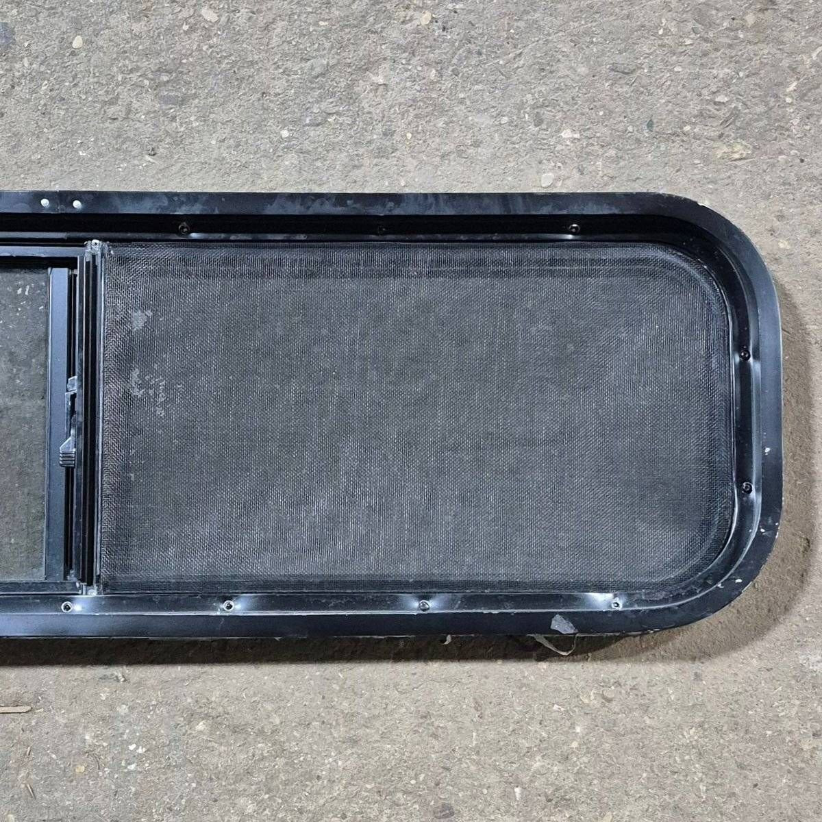 Used Black Radius Opening Window - 42 X 11 3/4 X 2 - Young Farts RV Parts