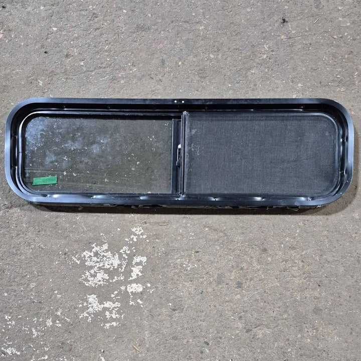 Used Black Radius Opening Window - 42 X 11 3/4 X 2 - Young Farts RV Parts