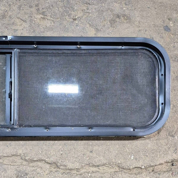 Used Black Radius Opening Window - 42 X 11.75 X 2 - Young Farts RV Parts