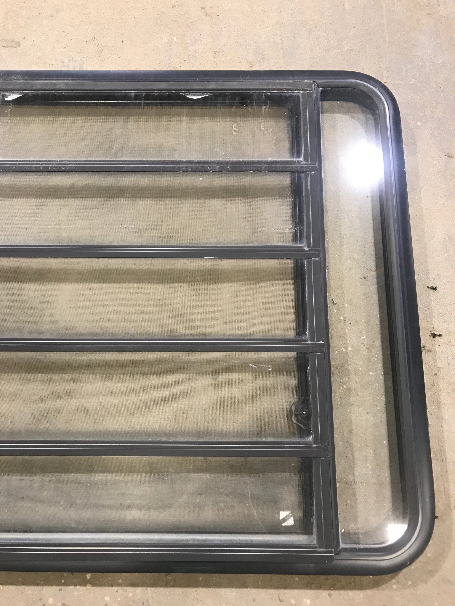 Used Black Radius Opening Window : 45 1/2" W x 35 3/4" H x 2" D - Young Farts RV Parts