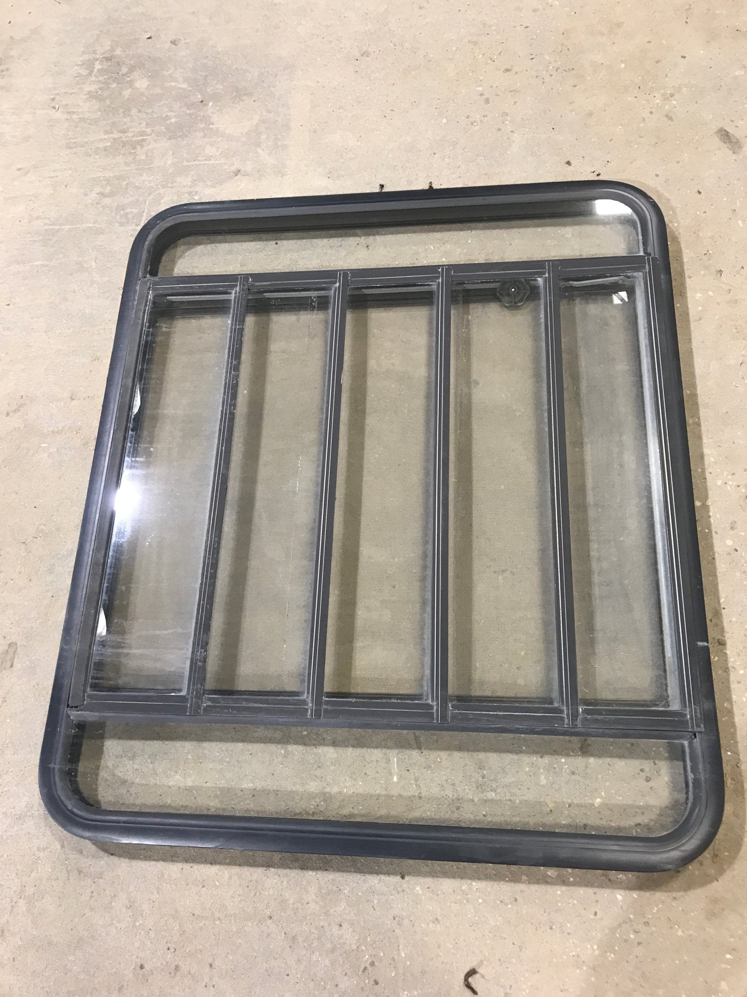 Used Black Radius Opening Window : 45 1/2" W x 35 3/4" H x 2" D - Young Farts RV Parts