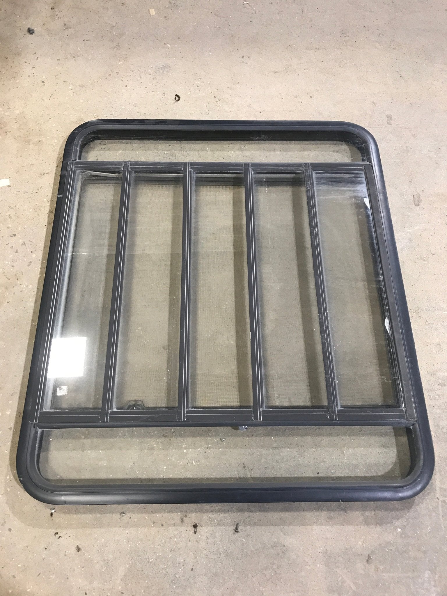 Used Black Radius Opening Window : 45 1/2" W x 35 3/4" H x 2" D - Young Farts RV Parts