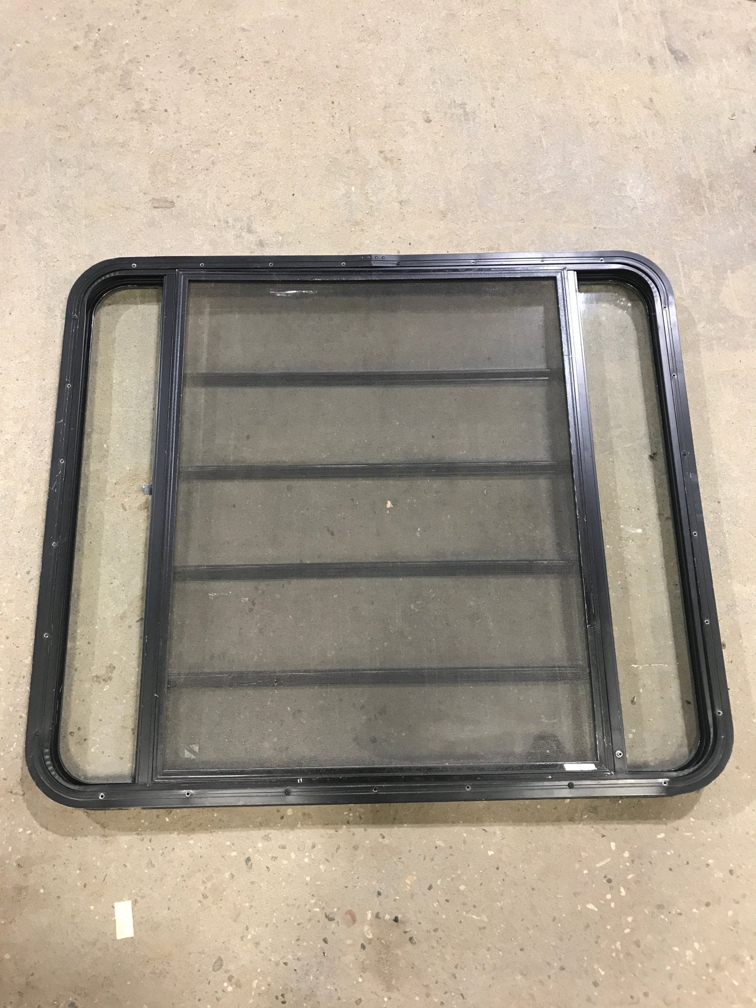 Used Black Radius Opening Window : 45 1/2" W x 35 3/4" H x 2" D - Young Farts RV Parts