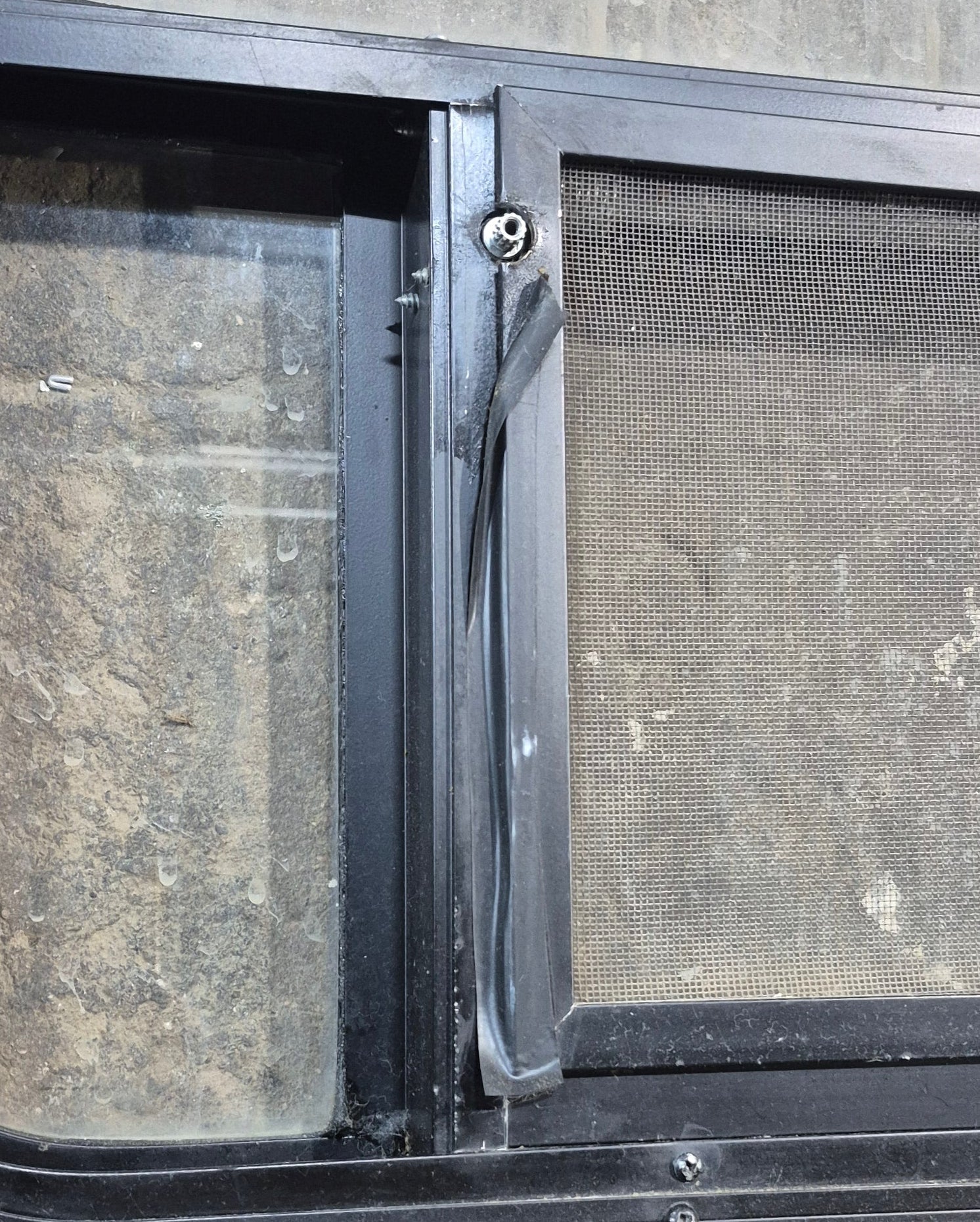 Used Black Radius Opening Window : 45 1/4" W x 21 1/4" H x 1 7/8" D - Young Farts RV Parts