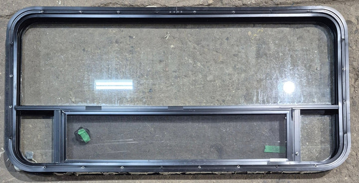 Used Black Radius Opening Window : 45 1/4" W x 21 1/4" H x 1 7/8" D - Young Farts RV Parts