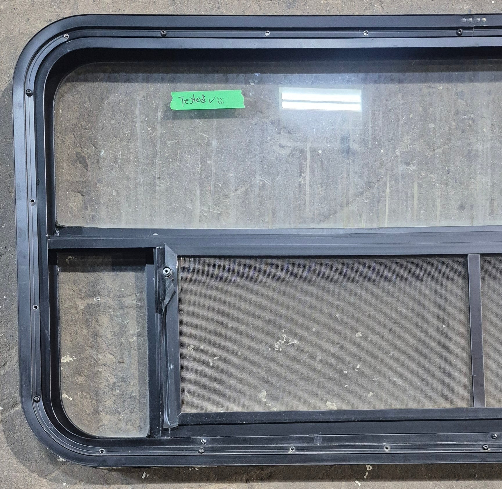 Used Black Radius Opening Window : 45 1/4" W x 21 1/4" H x 1 7/8" D - Young Farts RV Parts