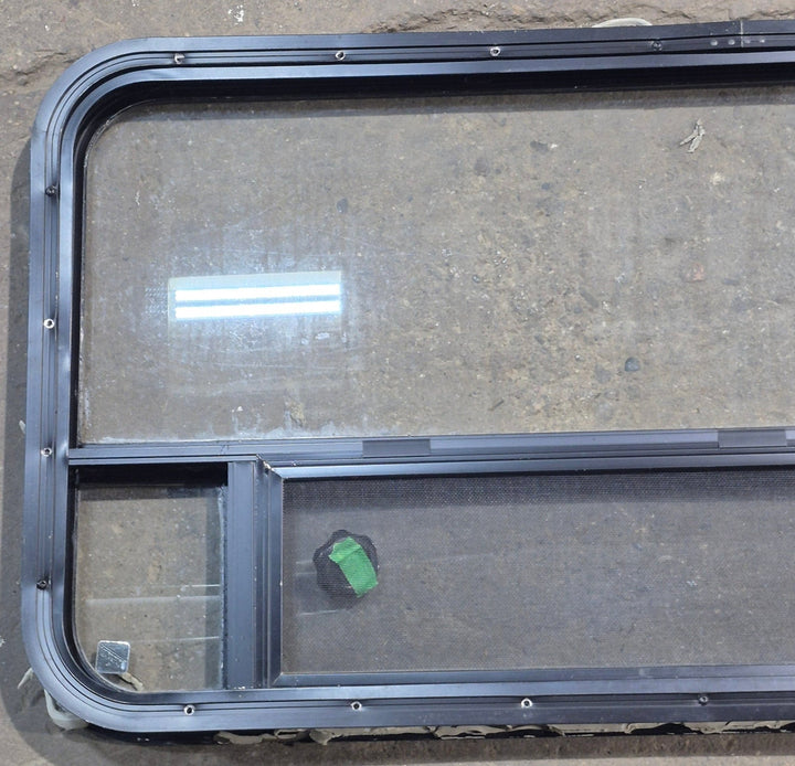 Used Black Radius Opening Window : 45 1/4" W x 21 1/4" H x 1 7/8" D - Young Farts RV Parts