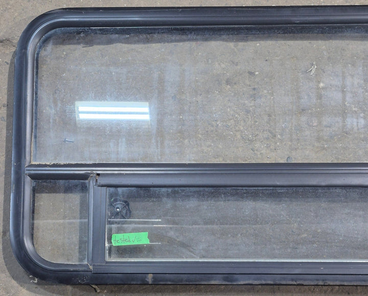 Used Black Radius Opening Window : 45 1/4" W x 21 1/4" H x 1 7/8" D - Young Farts RV Parts