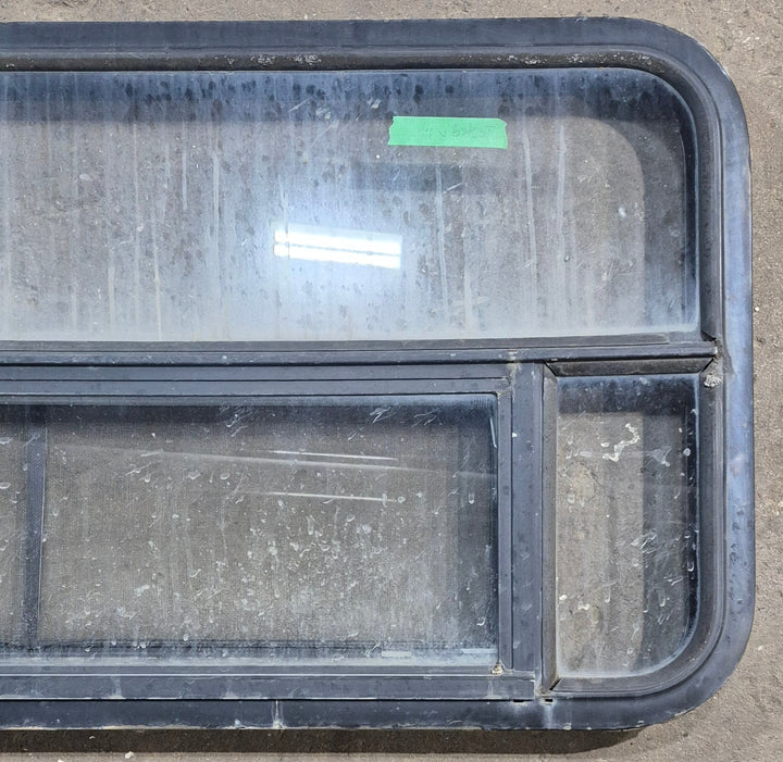 Used Black Radius Opening Window : 45 1/4" W x 21 1/4" H x 1 7/8" D - Young Farts RV Parts