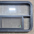 Used Black Radius Opening Window : 45 1/4" W x 21 1/4" H x 1 7/8" D - Young Farts RV Parts