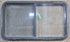 Used Black Radius Opening Window : 45 1/4" W x 25 1/4" H x 1 7/8" D - Young Farts RV Parts