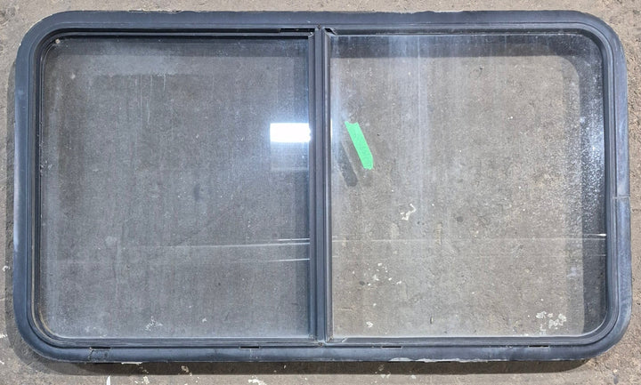 Used Black Radius Opening Window : 45 1/4" W x 25 1/4" H x 1 7/8" D - Young Farts RV Parts