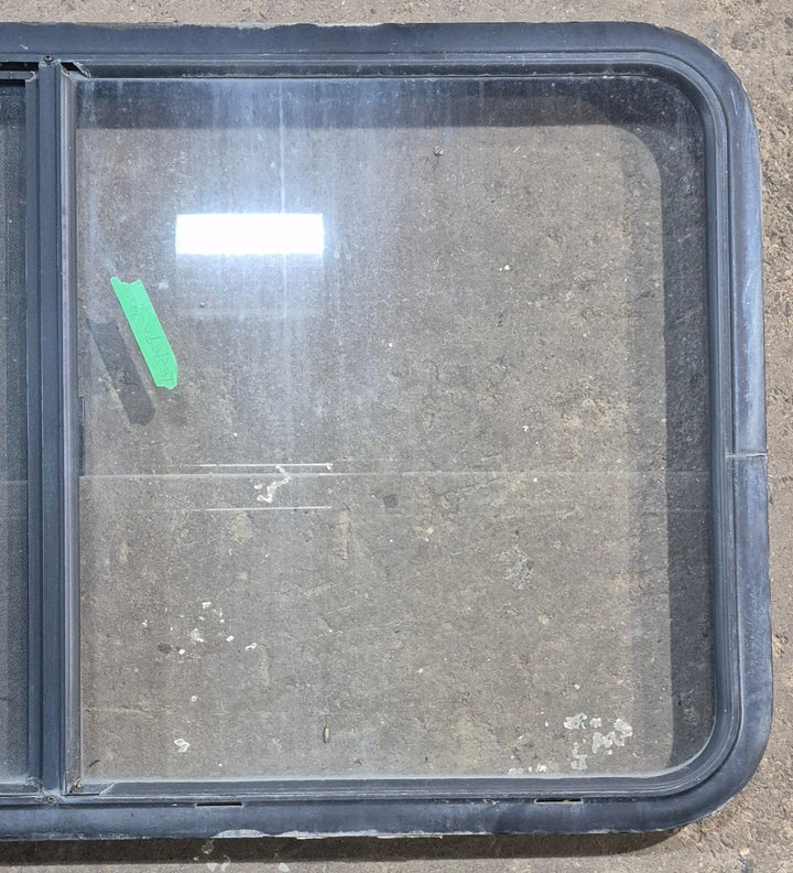 Used Black Radius Opening Window : 45 1/4" W x 25 1/4" H x 1 7/8" D - Young Farts RV Parts