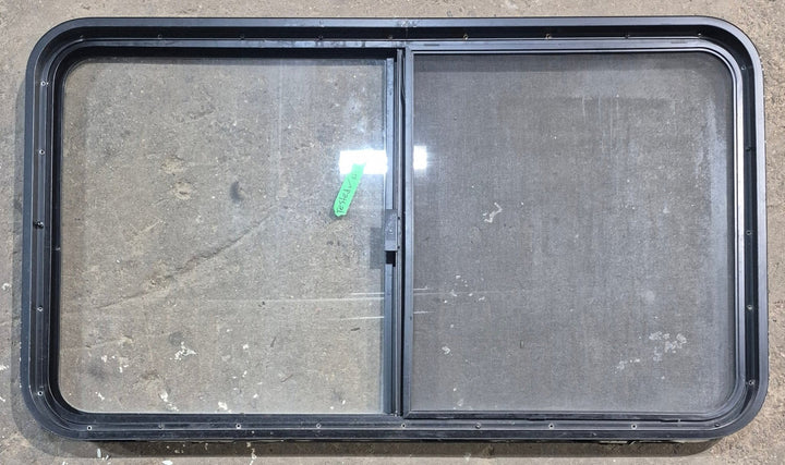 Used Black Radius Opening Window : 45 1/4" W x 25 1/4" H x 1 7/8" D - Young Farts RV Parts
