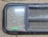 Used Black Radius Opening Window : 47 1/2" W x 14 3/4" H x 1 3/4" D - Young Farts RV Parts