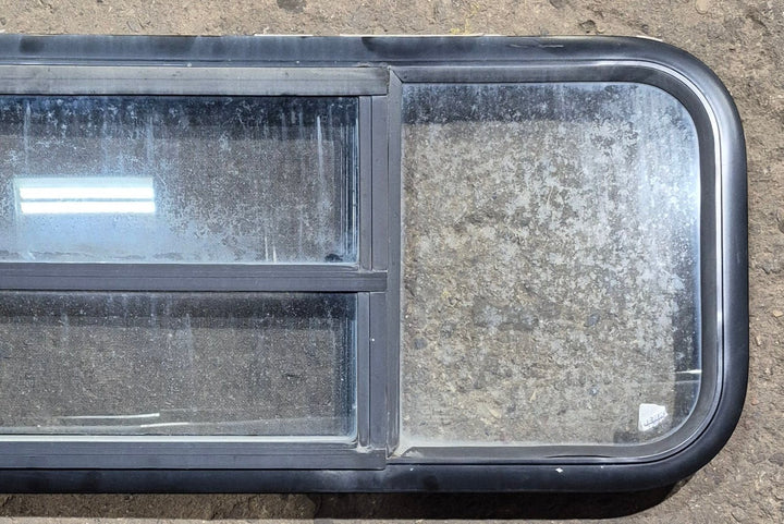 Used Black Radius Opening Window : 47 1/2" W x 14 3/4" H x 1 3/4" D - Young Farts RV Parts