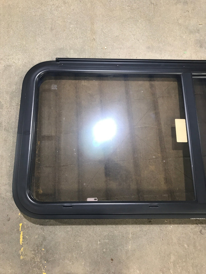 Used Black Radius Opening Window : 47 1/2" W x 21 1/2" H x 1 1/2" D - Young Farts RV Parts