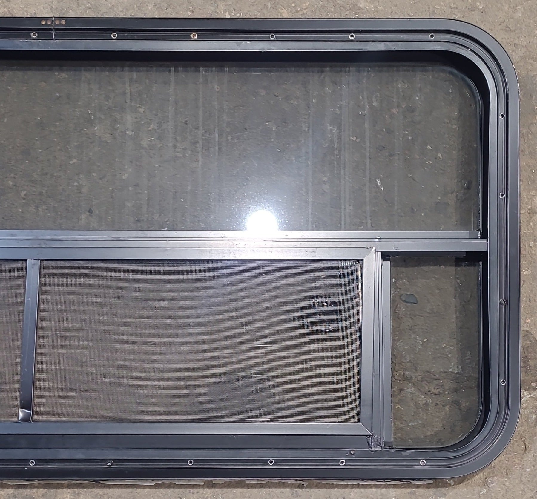 Used Black Radius Opening Window : 47 1/2" W x 21 1/2" H x 1 3/4" D - Young Farts RV Parts