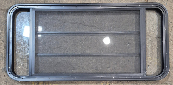 Used Black Radius Opening Window : 47 1/2" W x 22 1/4" H x 1 3/4" - Young Farts RV Parts
