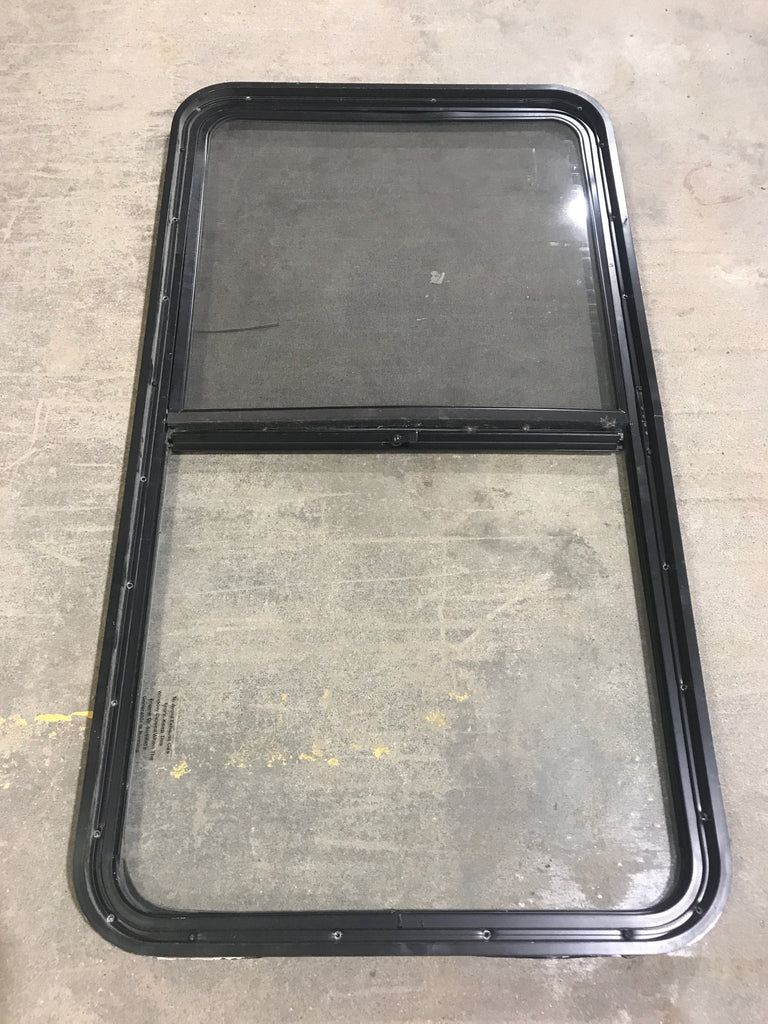 Used Black Radius Opening Window : 47 1/2" W x 25 3/4" H x 2" D - Young Farts RV Parts