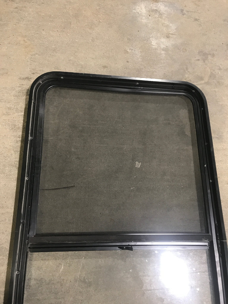 Used Black Radius Opening Window : 47 1/2" W x 25 3/4" H x 2" D - Young Farts RV Parts