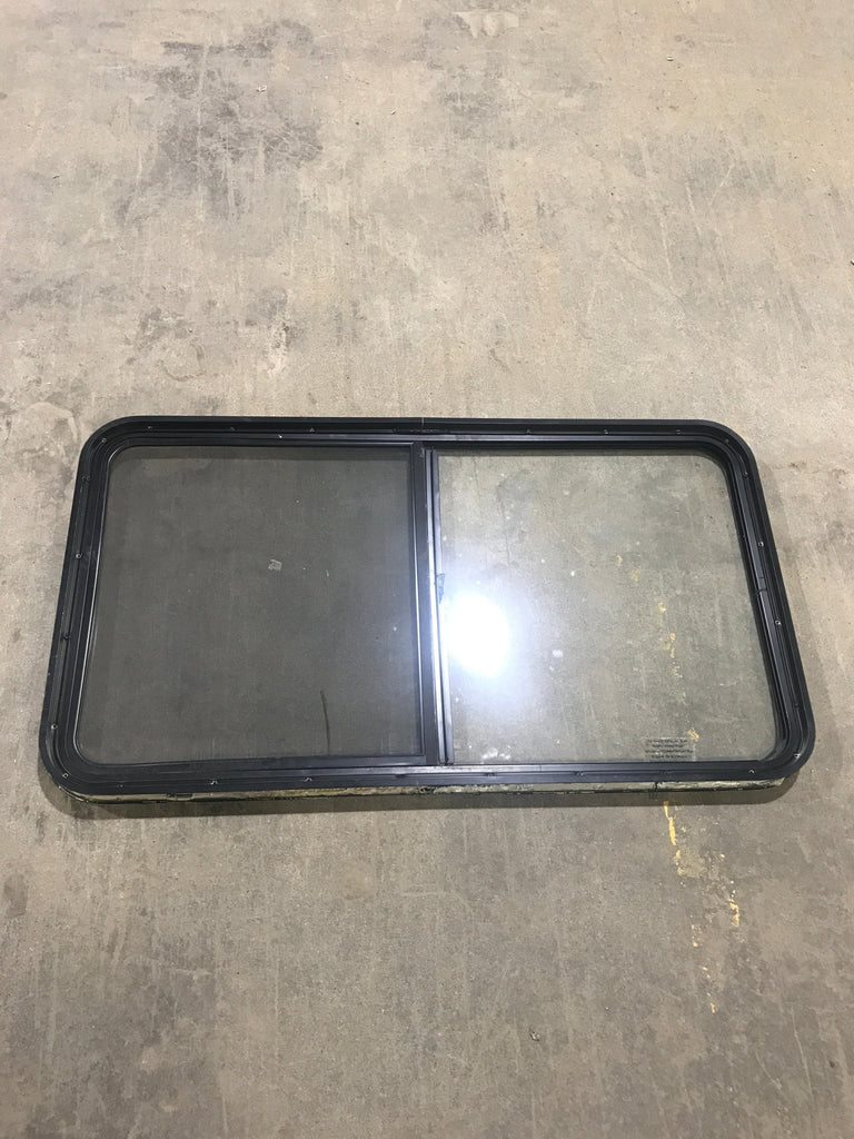 Used Black Radius Opening Window : 47 1/2" W x 25 3/4" H x 2" D - Young Farts RV Parts