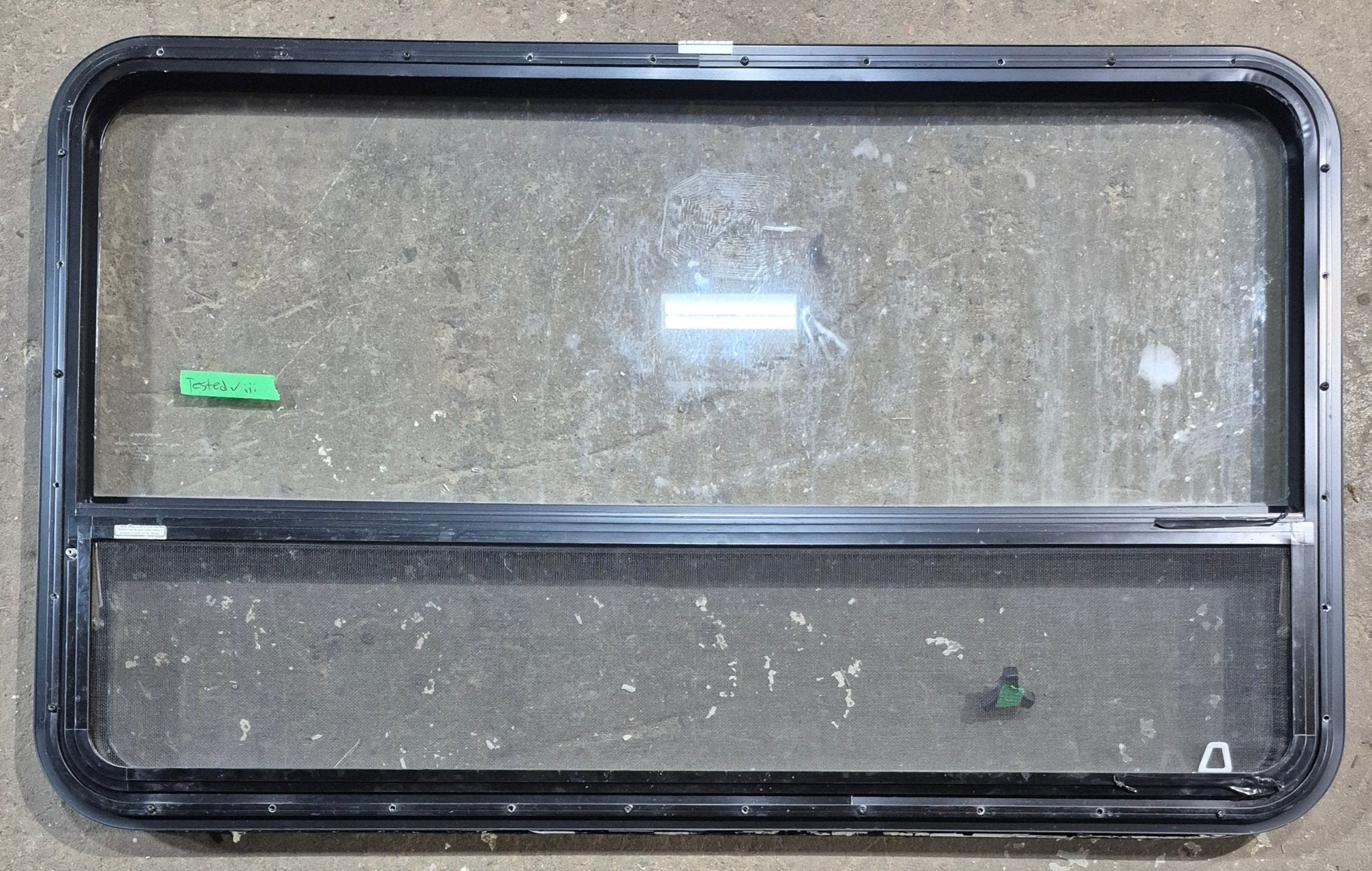 Used Black Radius Opening Window : 47 1/2" W x 28 1/4" H x 1 1/4" D - Young Farts RV Parts