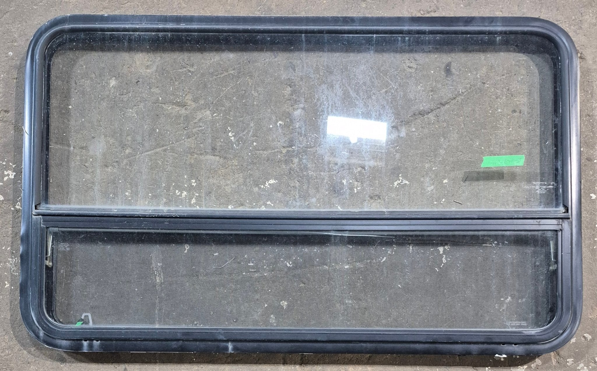 Used Black Radius Opening Window : 47 1/2" W x 28 1/4" H x 1 1/4" D - Young Farts RV Parts