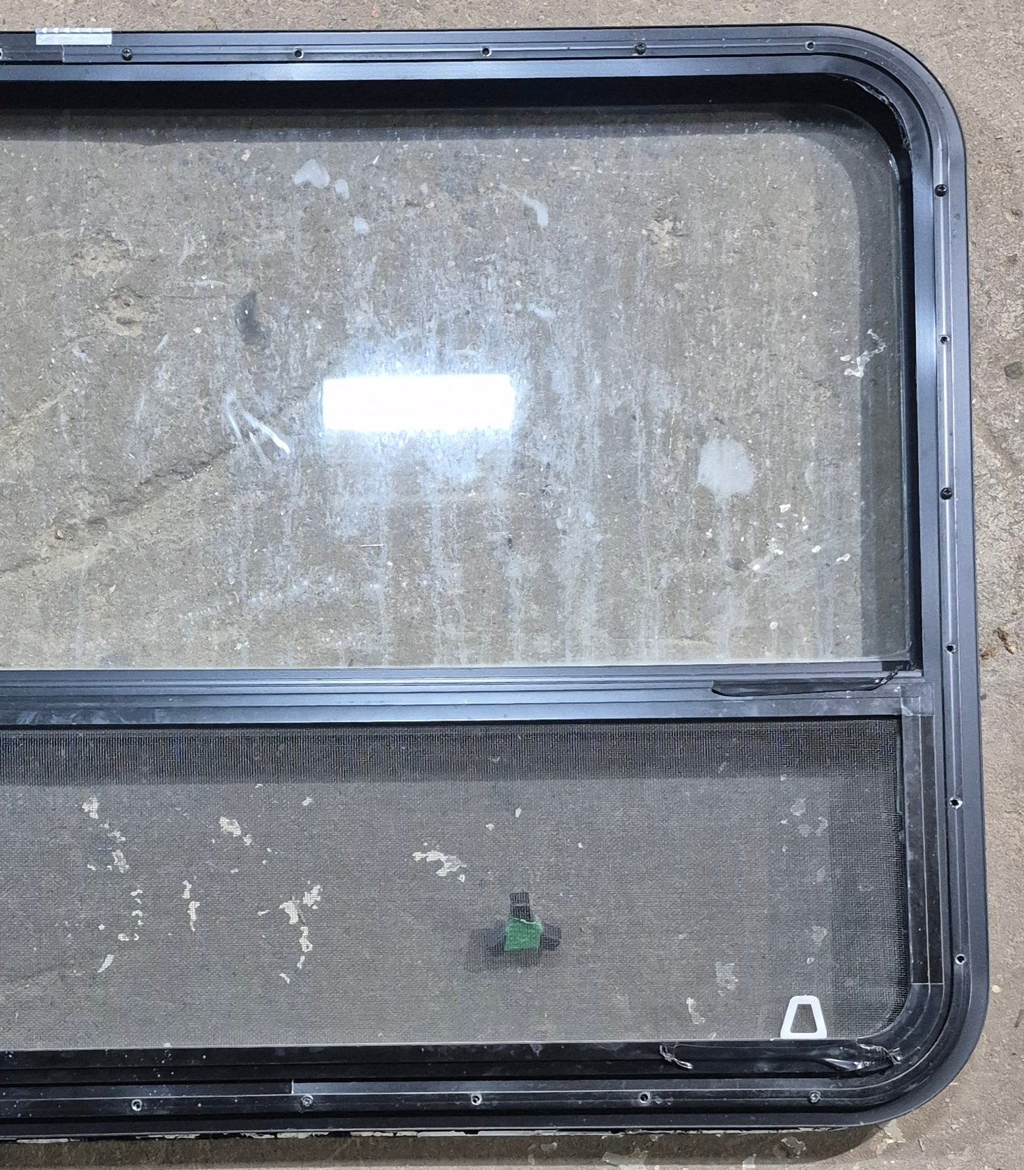 Used Black Radius Opening Window : 47 1/2" W x 28 1/4" H x 1 1/4" D - Young Farts RV Parts