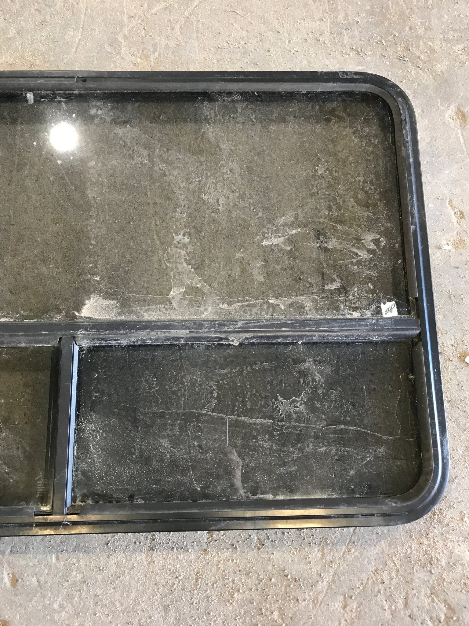 Used Black Radius Opening Window : 47 1/2" W x 30" H x 2" D - Young Farts RV Parts