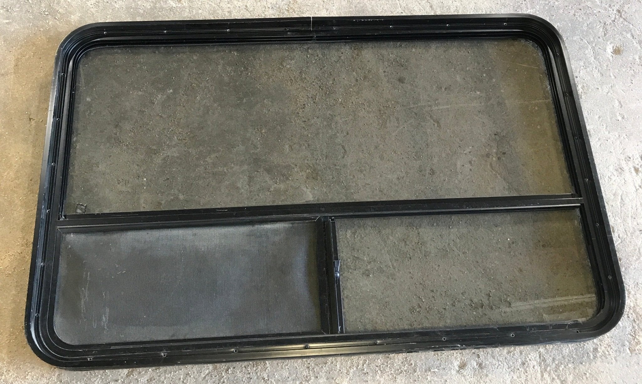 Used Black Radius Opening Window : 47 1/2" W x 30" H x 2" D - Young Farts RV Parts