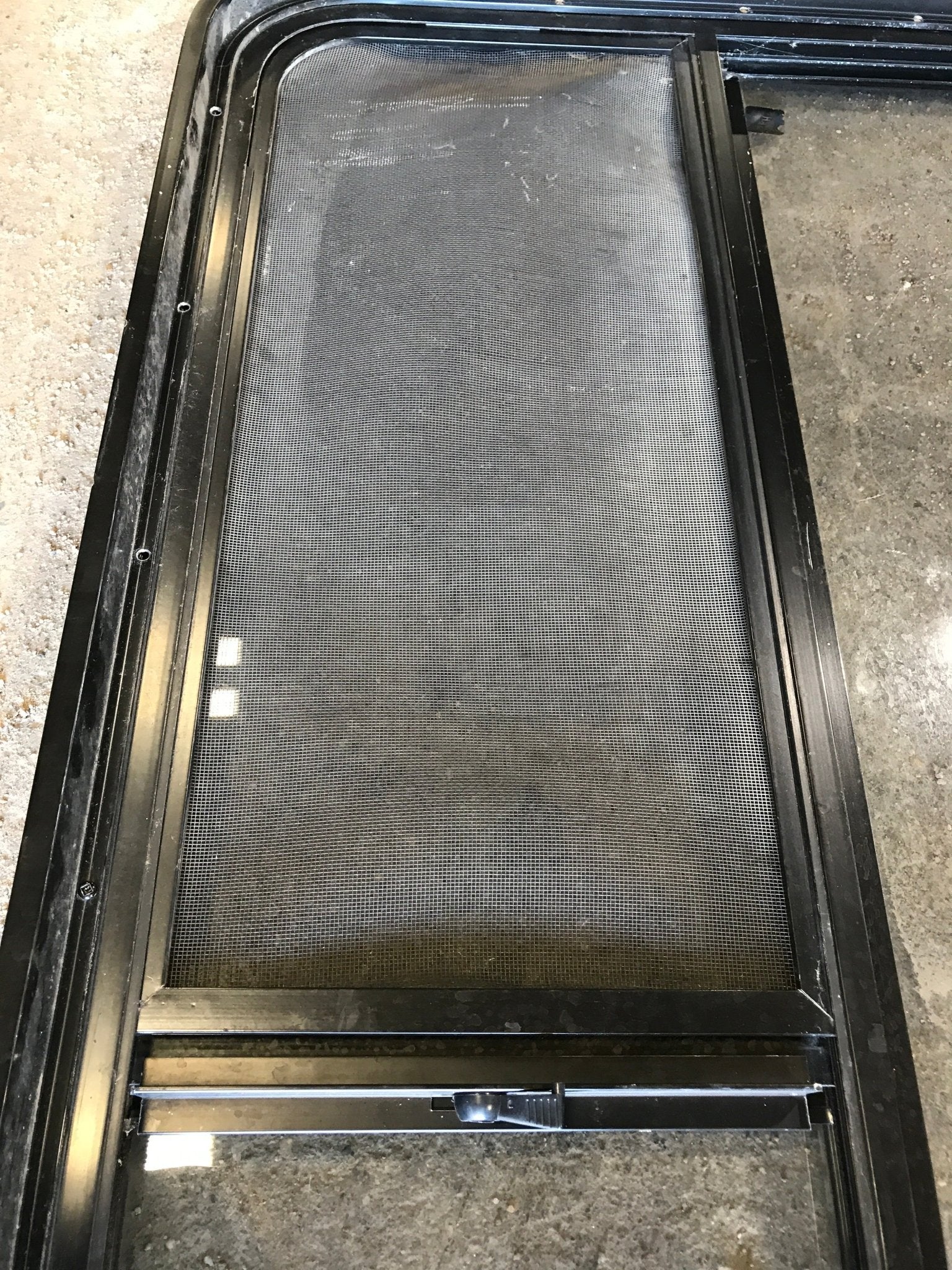 Used Black Radius Opening Window : 47 1/2" W x 30" H x 2" D - Young Farts RV Parts
