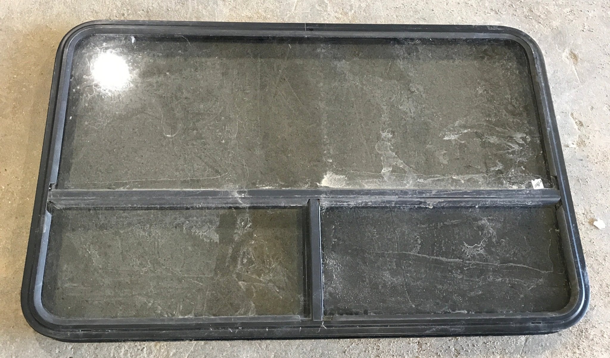 Used Black Radius Opening Window : 47 1/2" W x 30" H x 2" D - Young Farts RV Parts
