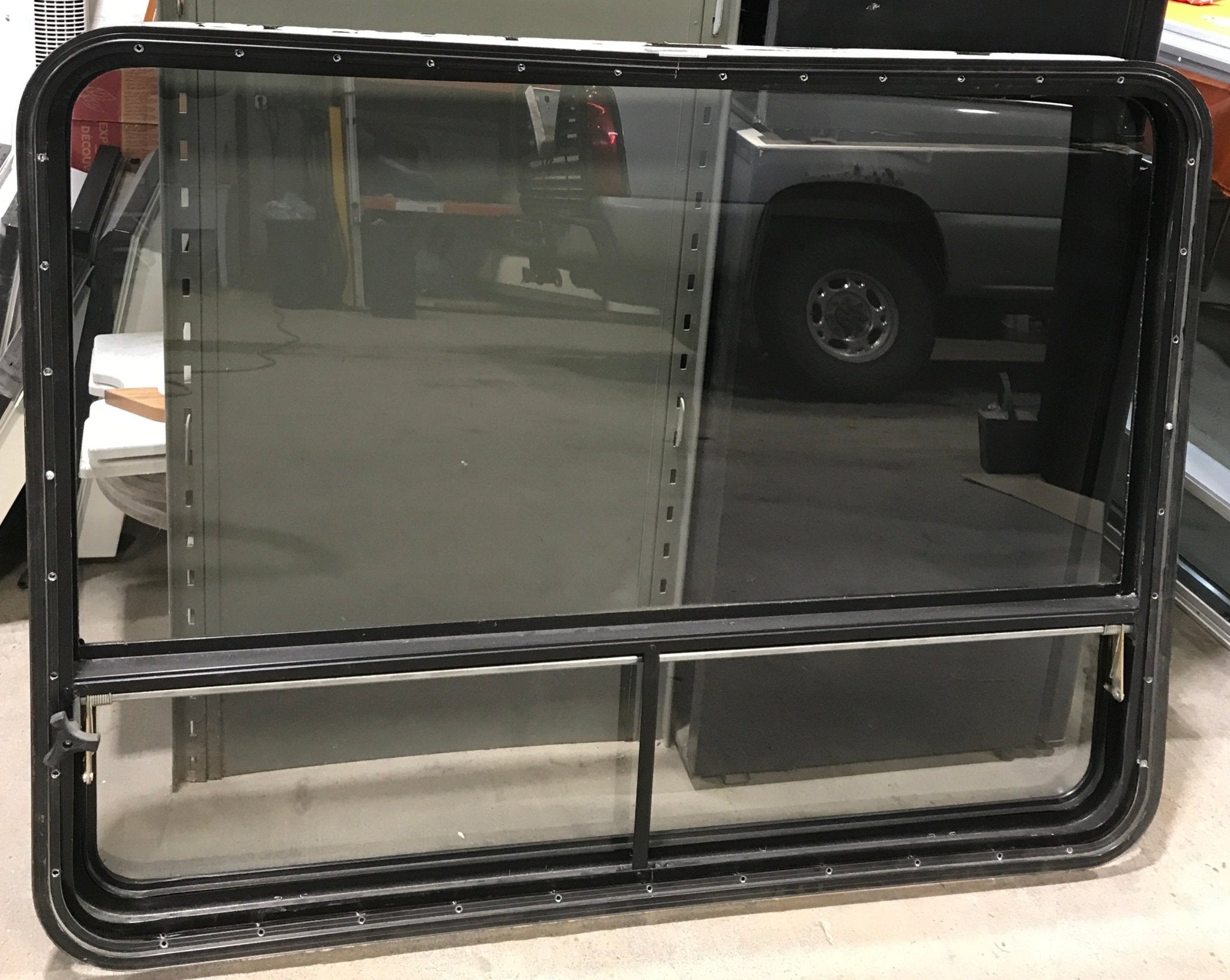 Used Black Radius Opening Window : 47 1/2" W x 35 1/2" H x 2" D - Young Farts RV Parts