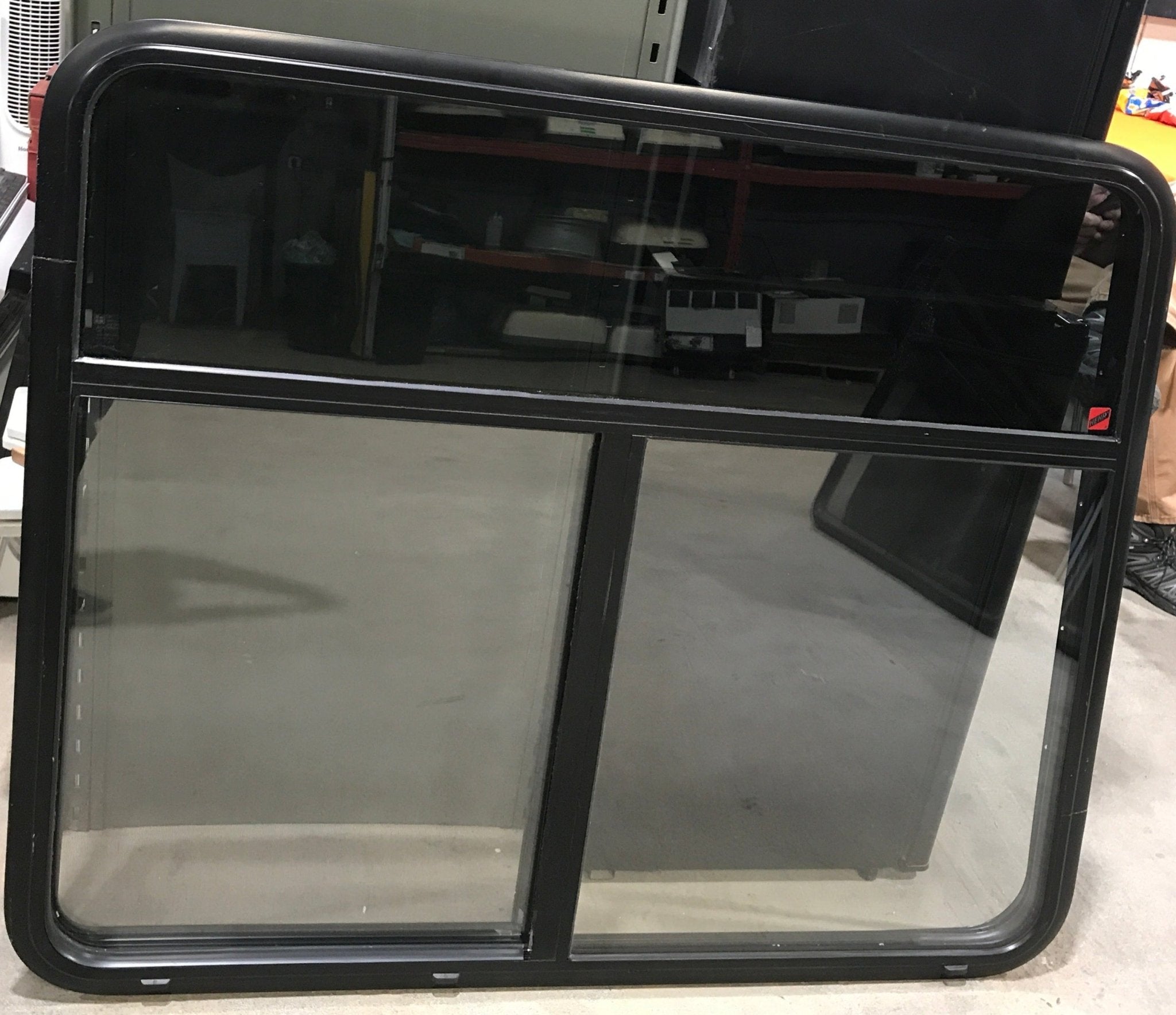 Used Black Radius Opening Window : 47 1/2" W x 39" H x 1 3/4" D - Young Farts RV Parts