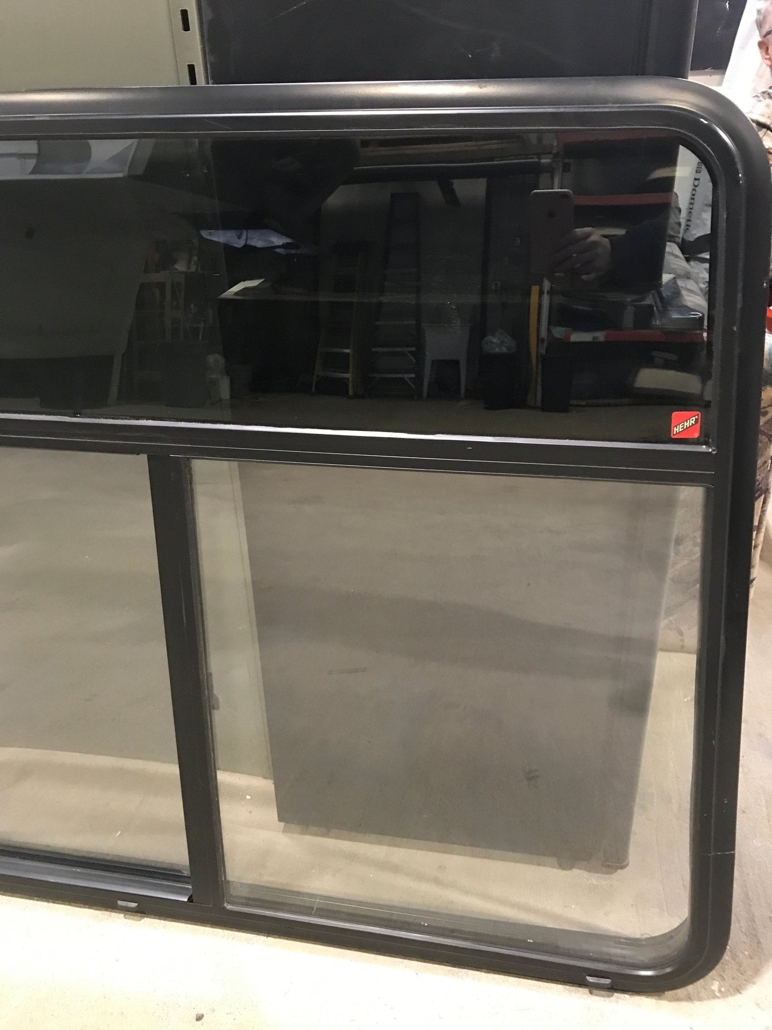 Used Black Radius Opening Window : 47 1/2" W x 39" H x 1 3/4" D - Young Farts RV Parts
