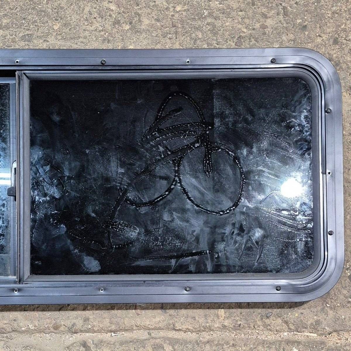 Used Black Radius Opening Window - 47 1/2" X 17 1/2" X 1 7/8" - Young Farts RV Parts