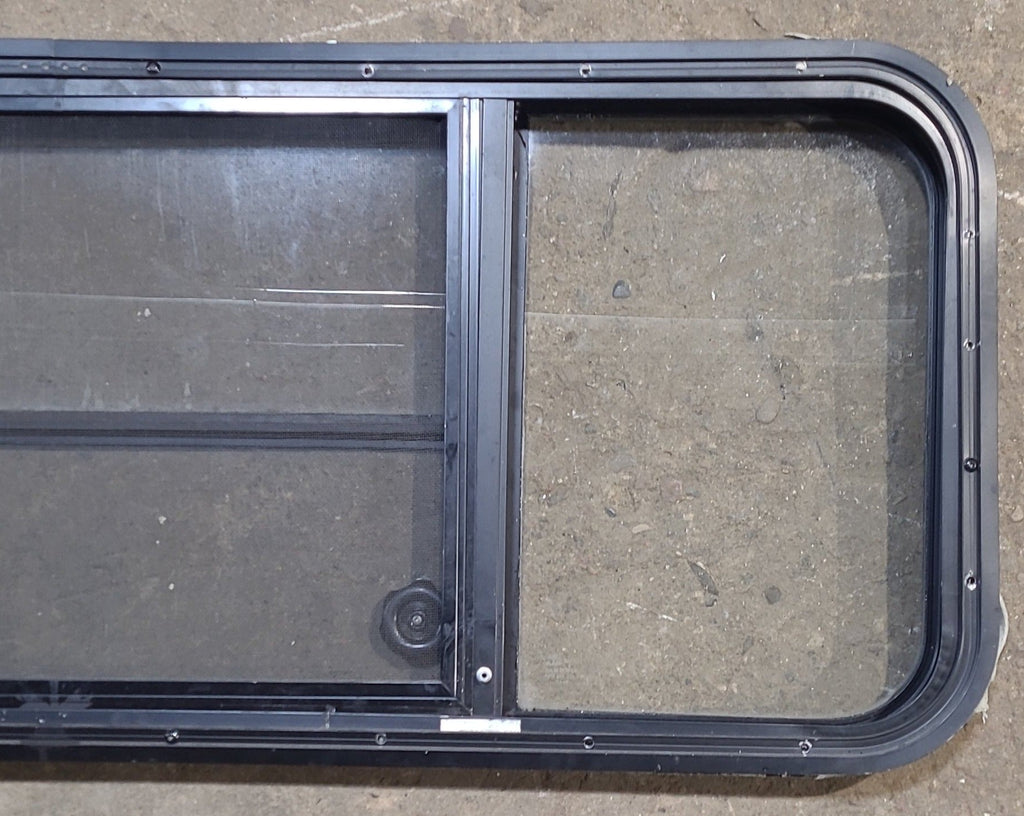Used Black Radius Opening Window : 47 1/4" W x 17 1/2" H x 1 7/8" D - Young Farts RV Parts