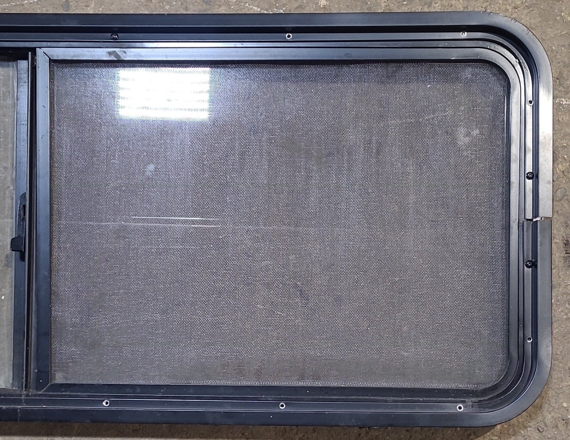 Used Black Radius Opening Window : 47 1/4" W x 17 1/4" H x 1 7/8" D - Young Farts RV Parts