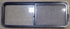 Used Black Radius Opening Window : 47 1/4" W x 17 1/4" H x 1 7/8" D - Young Farts RV Parts