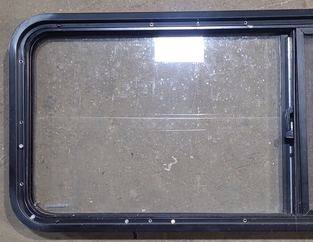 Used Black Radius Opening Window : 47 1/4" W x 17 1/4" H x 1 7/8" D - Young Farts RV Parts
