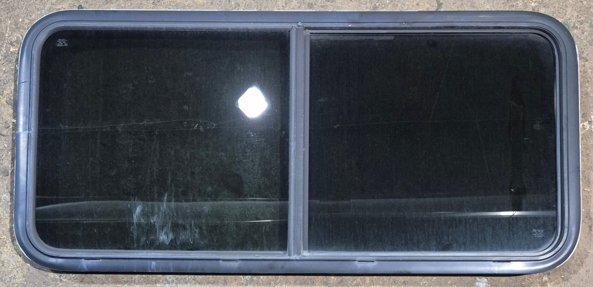 Used Black Radius Opening Window : 47 1/4" W x 21 1/2" H x 1 3/4" - Young Farts RV Parts