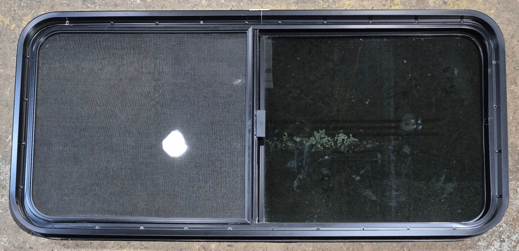 Used Black Radius Opening Window : 47 1/4" W x 21 1/2" H x 1 3/4" - Young Farts RV Parts
