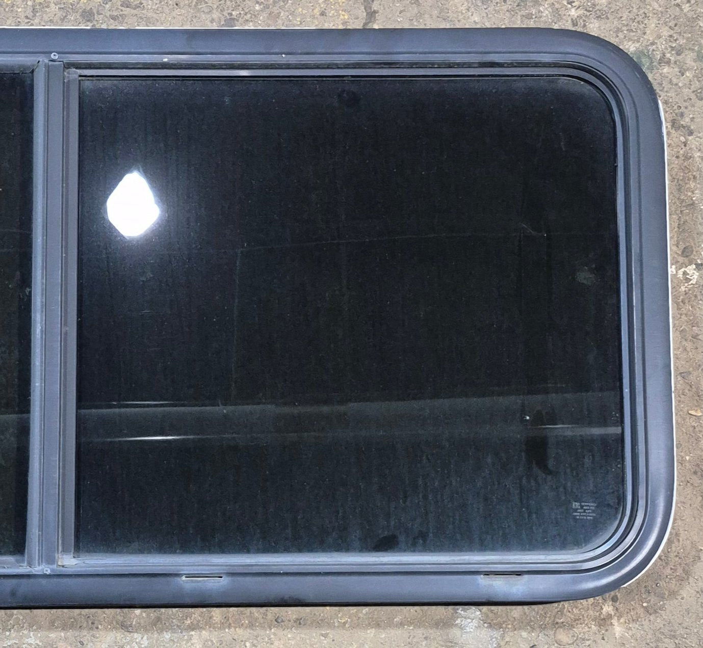 Used Black Radius Opening Window : 47 1/4" W x 21 1/2" H x 1 3/4" - Young Farts RV Parts