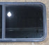 Used Black Radius Opening Window : 47 1/4" W x 21 1/2" H x 1 3/4" - Young Farts RV Parts