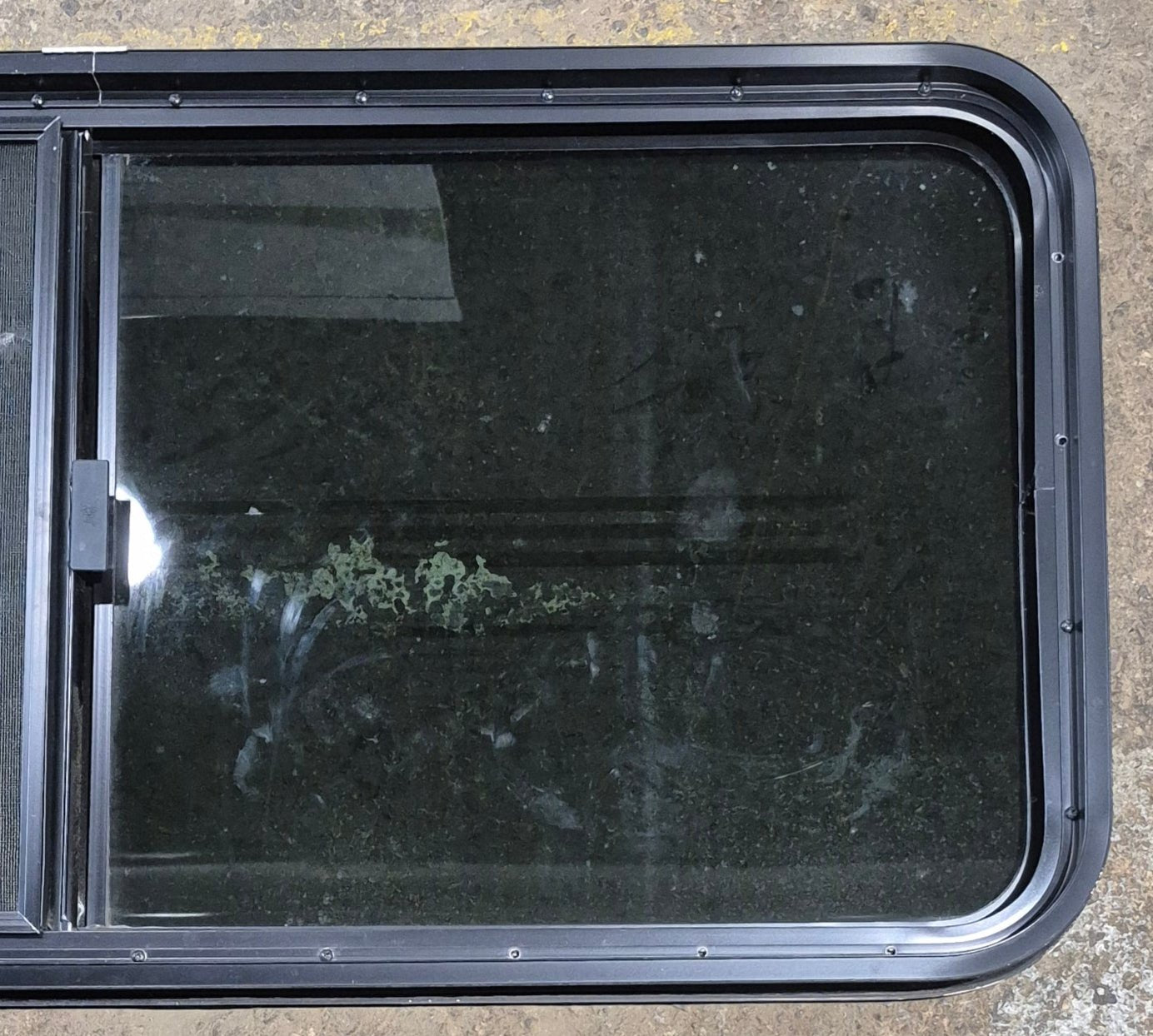Used Black Radius Opening Window : 47 1/4" W x 21 1/2" H x 1 3/4" - Young Farts RV Parts