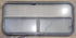 Used Black Radius Opening Window : 47 1/4" W x 21 1/4" H x 1 7/8" - Young Farts RV Parts