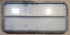 Used Black Radius Opening Window : 47 1/4" W x 21 1/4" H x 1 7/8" - Young Farts RV Parts