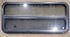 Used Black Radius Opening Window : 47 1/4" W x 21 1/4" H x 1 7/8" - Young Farts RV Parts