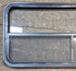 Used Black Radius Opening Window : 47 1/4" W x 21 1/4" H x 1 7/8" - Young Farts RV Parts